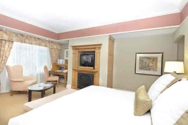 Old Mill Toronto guest suite with lounge area for VIP accommodations and corporate meetings.