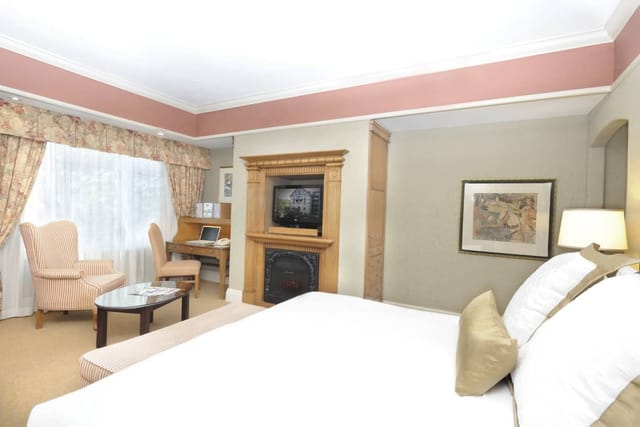 Old Mill Toronto guest suite with lounge area for VIP accommodations and corporate meetings.