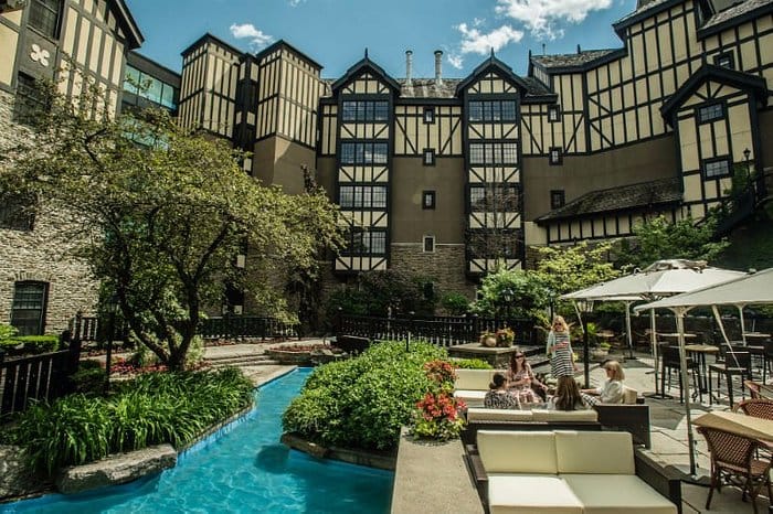 Outdoor lounge with water feature at Old Mill Toronto, perfect for corporate retreats and networking.