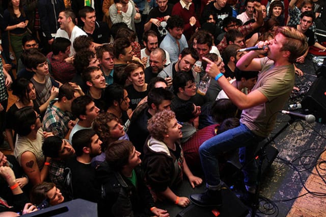 Live music at The Great Hall, crowded performance, concert event, risk management.