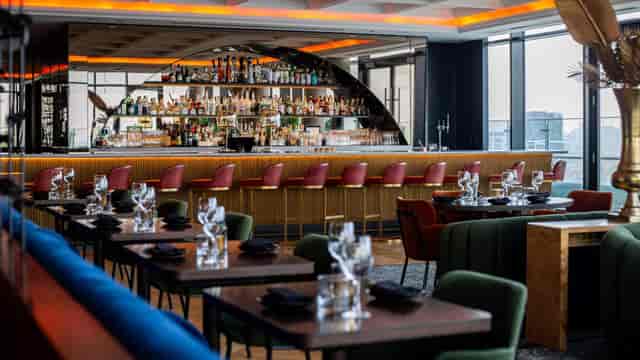 Sophisticated Hotel X Toronto rooftop lounge for upscale corporate cocktail events and networking.