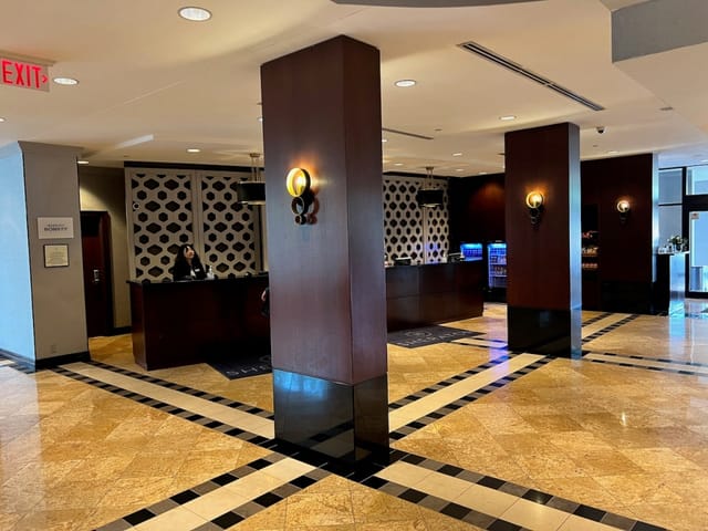 Sheraton Toronto Airport hotel lobby registration desk for corporate conferences and events.