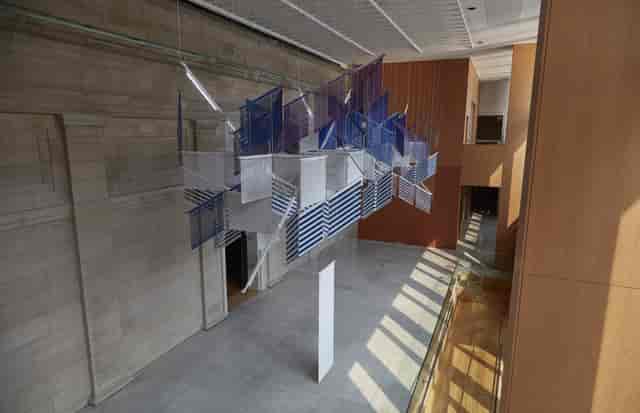 Art Gallery of Ontario atrium with suspended sculpture for elegant weddings and corporate events.