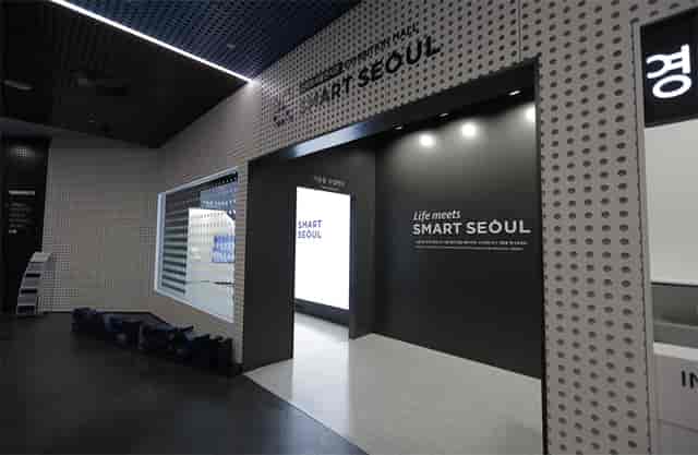 Modern exhibition booth entrance with high-tech lighting for trade show or corporate event.