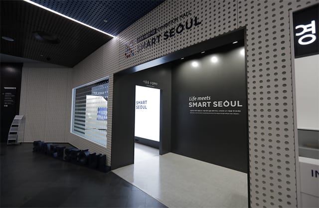 Modern exhibition booth entrance with high-tech lighting for trade show or corporate event.