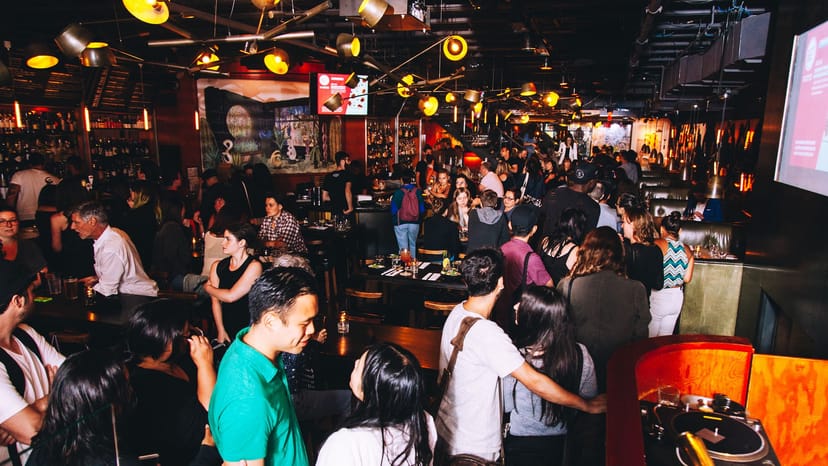 Crowded networking lounge at The Drake Hotel, ideal for corporate mixers and social events.