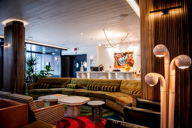 Boutique hotel lounge at The Drake for VIP check-ins and networking events.
