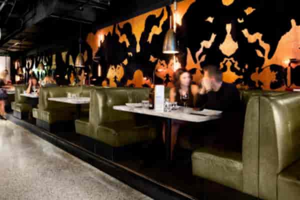 Moody semi-private dining room at The Drake Hotel for VIP networking and executive dinners.
