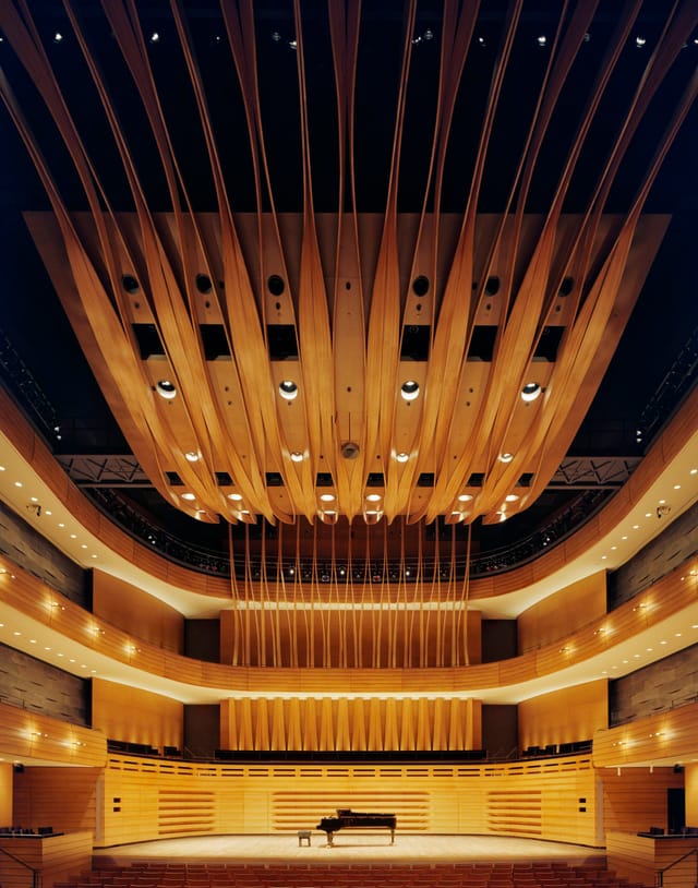 Temerty Theatre in Koerner Hall with architectural ceiling, ideal for keynote and plenary events.