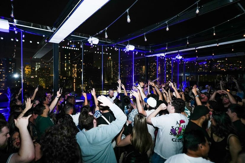 Harriet's Rooftop event with string lights and DJ for corporate social or incentive wrap party.