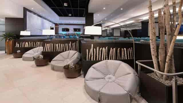 Modern Pan Pacific Toronto lounge with modular seating for networking and breakout sessions.