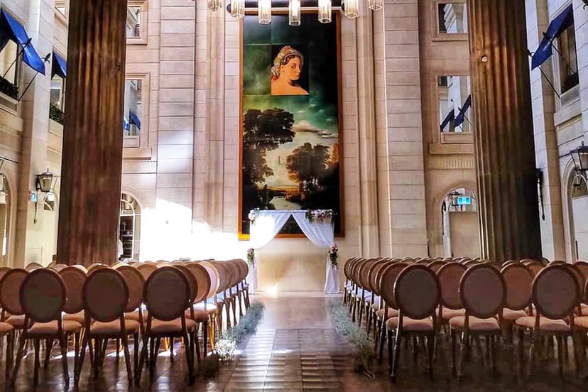 Windsor Arms Hotel theater-style ceremony venue with grand architectural ceilings.