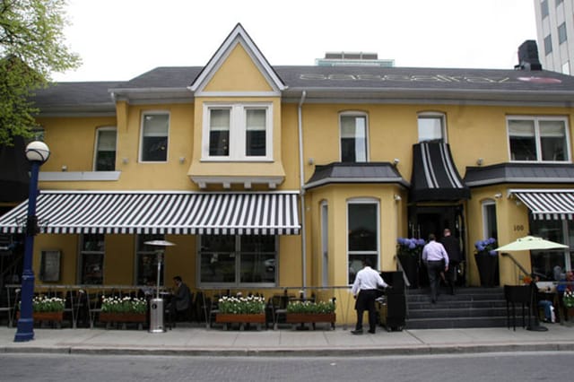 Sassafraz restaurant with yellow facade for corporate receptions and private dining events.