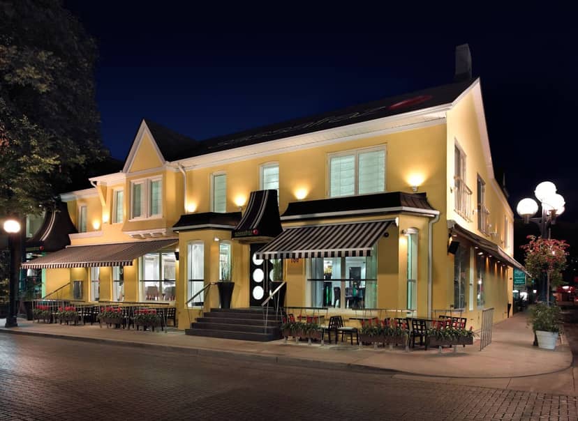 Sassafraz boutique patio, charming curb appeal, ideal for networking receptions and event buyouts.