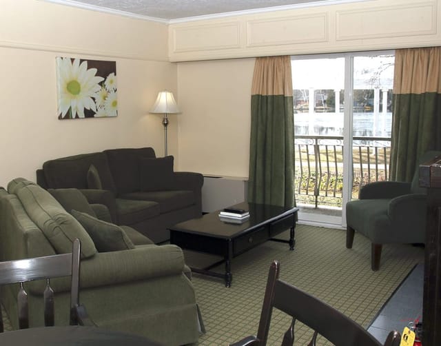 Fern Resort Fireside suite: cozy hotel living area for corporate breakout sessions and VIP events.