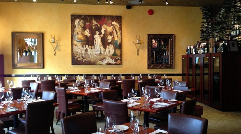 Via Allegro Ristorante dining room with uniform table settings for corporate events or group dining.