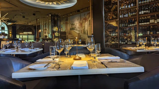Elegant patio dining at Via Allegro Ristorante for executive dinners and VIP networking events.