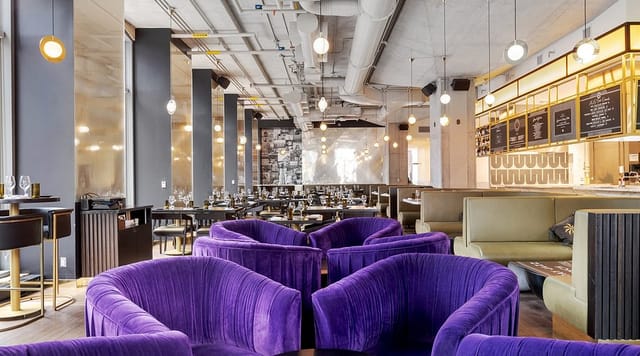 High-end Ricarda's cafe venue with lounge and dining areas for corporate events and receptions.