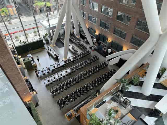 Industrial banquet venue at Ricarda's with long tables for corporate events and weddings.