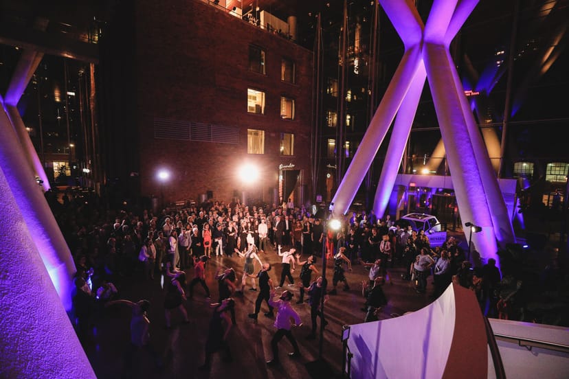 Ricarda's event venue with dramatic uplighting for corporate networking and evening receptions.
