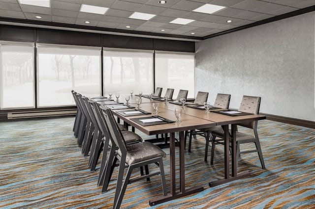 Boardroom at Westin Harbour Castle with natural light for strategy sessions and corporate meetings.
