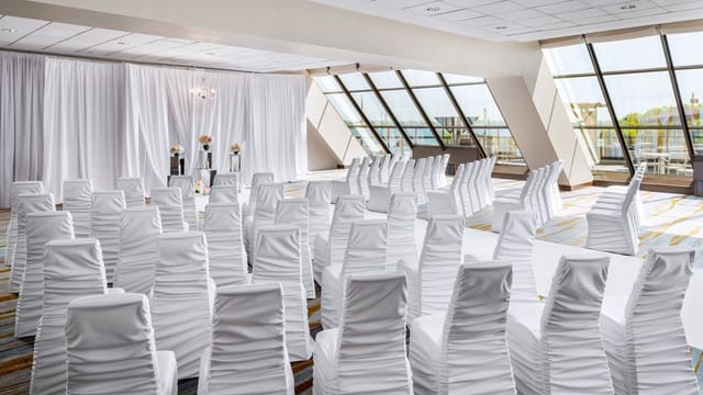 Westin Harbour Castle conference room: theater seating with elegant backdrop for corporate events.