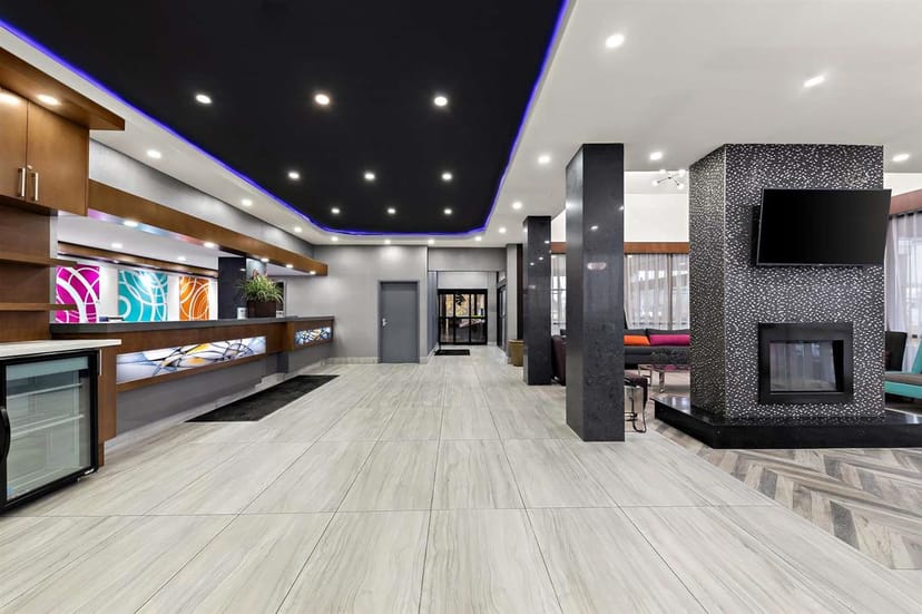Modern hotel lounge with feature fireplace for networking and corporate events.