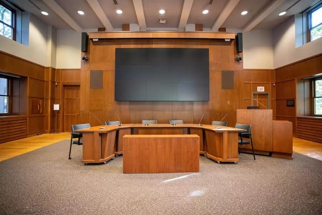 U-shaped boardroom at Munk School for executive meetings and panel discussions.