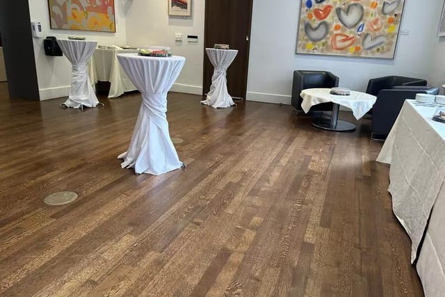 North House reception area with cocktail tables and lounge seating for professional networking.
