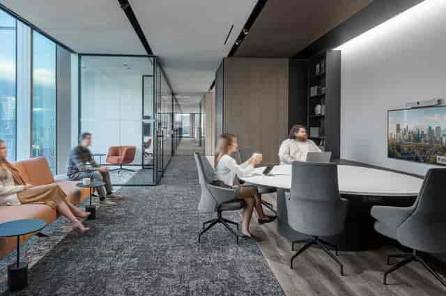 Hybrid meeting room with round table at CIBC SQUARE for professional corporate event networking.