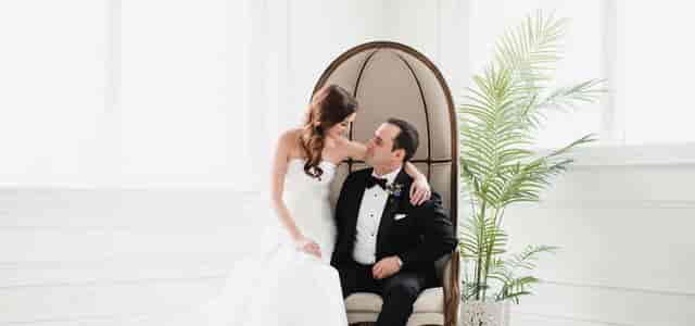 Elegant bridal suite with luxury lounge furniture for wedding photography and event venue.