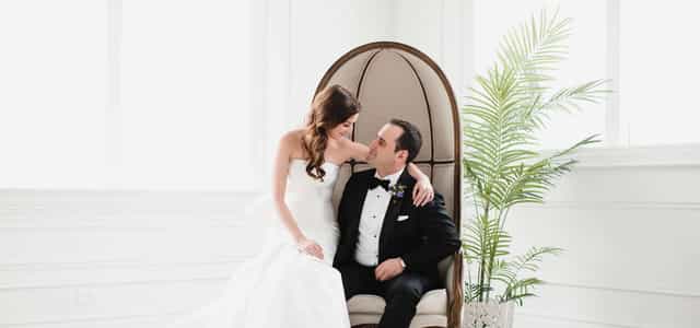 Elegant bridal suite with luxury lounge furniture for wedding photography and event venue.