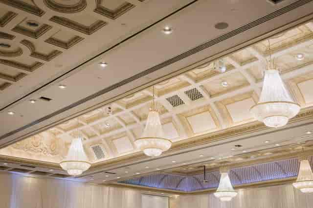 Chateau Le Jardin ballroom with crystal chandeliers, perfect for wedding and gala event venues.