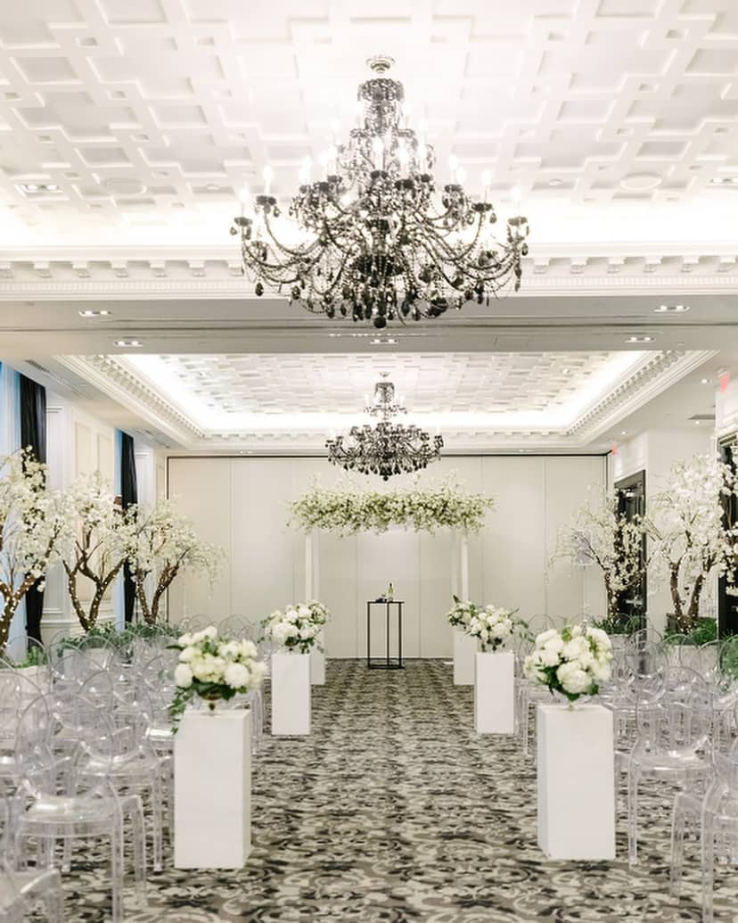 St. Regis Toronto wedding ballroom with cherry blossom decor for luxury ceremony photography.