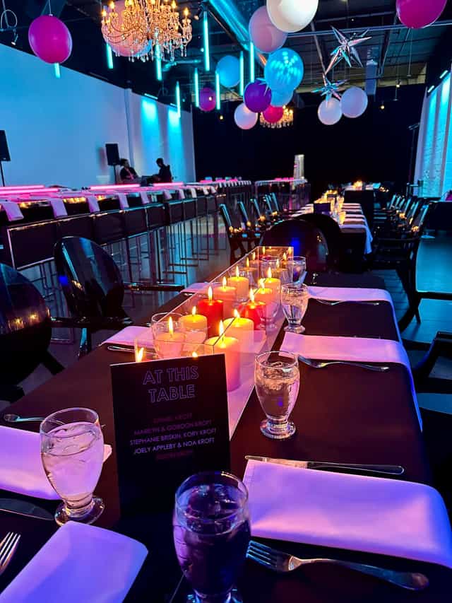 Modern gala banquet setup at The Factory Lounge with sleek seating and warm evening lighting.