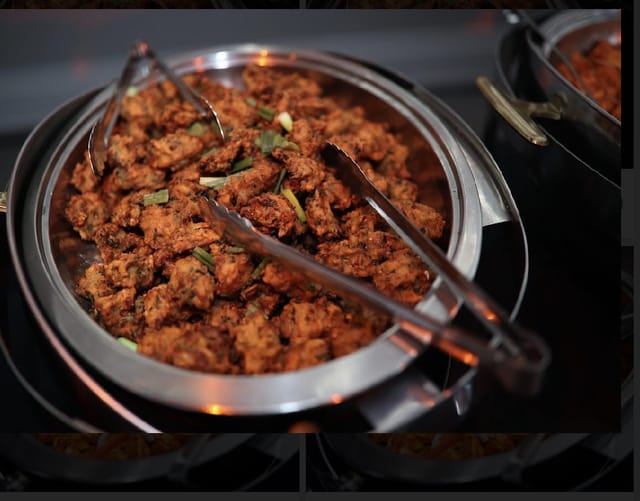 Chafing dish with fried appetizers at Palacio Event Centre for catering and networking events.