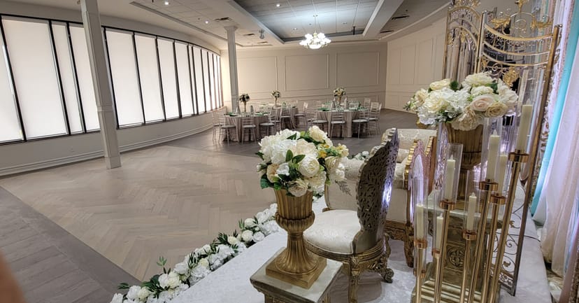 Arriba at Palacio Event Centre: Herringbone dance floor and sweetheart stage for wedding receptions.