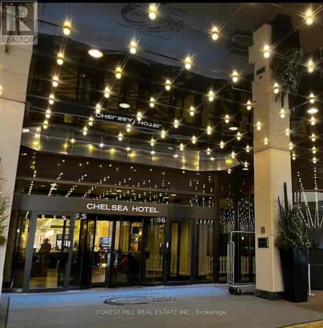 Monarch's at Chelsea Hotel Toronto exterior with festive lights for corporate events and galas.