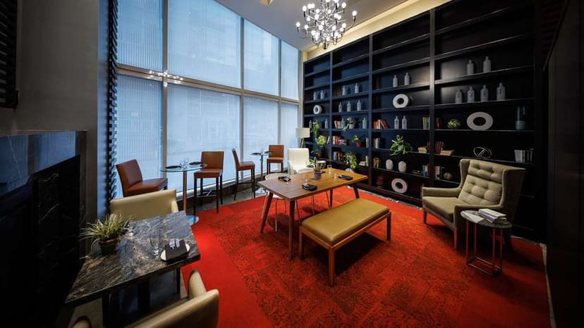 Pantages Hotel boardroom with red carpet for VIP networking and corporate meetings.