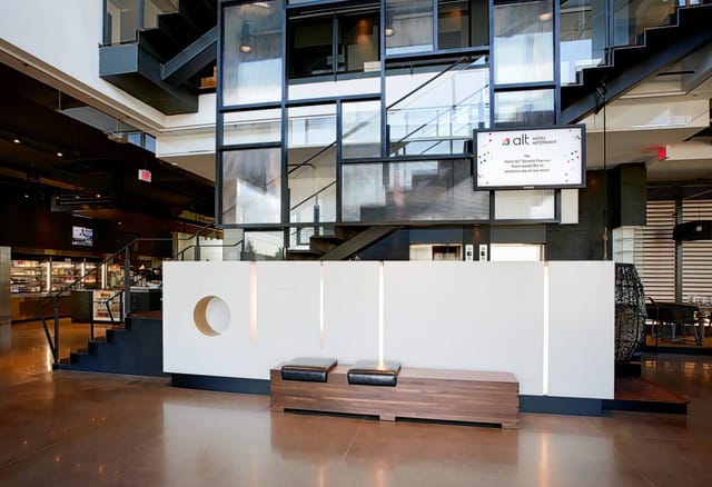 Modern hotel lobby, Alt Hotel Toronto Airport, sleek event breakout space, professional venue.