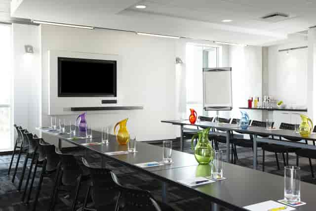 U-shaped boardroom at Alt Hotel Toronto Airport for corporate meetings and professional workshops.