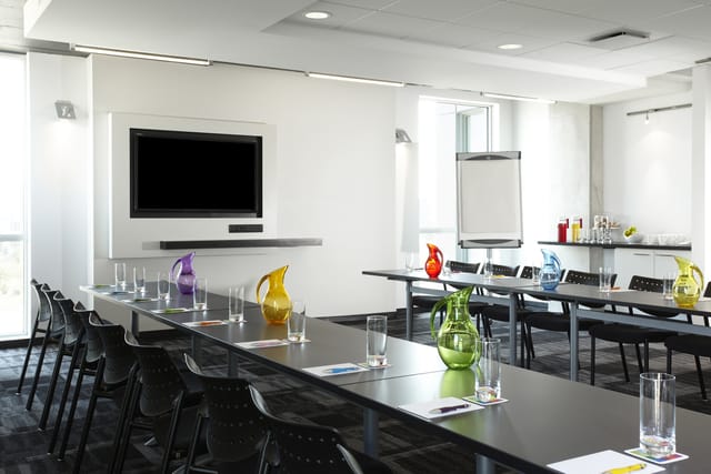 U-shaped boardroom at Alt Hotel Toronto Airport for corporate meetings and professional workshops.