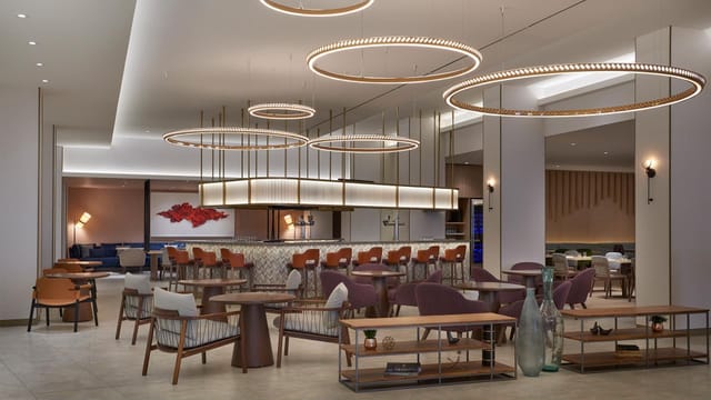 Hilton Toronto Airport hotel event space with lounge seating for networking receptions.