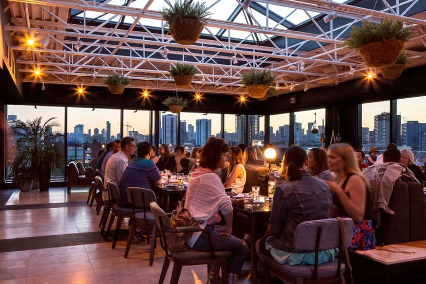 Industrial-chic W Toronto rooftop venue for corporate networking and professional social mixers.