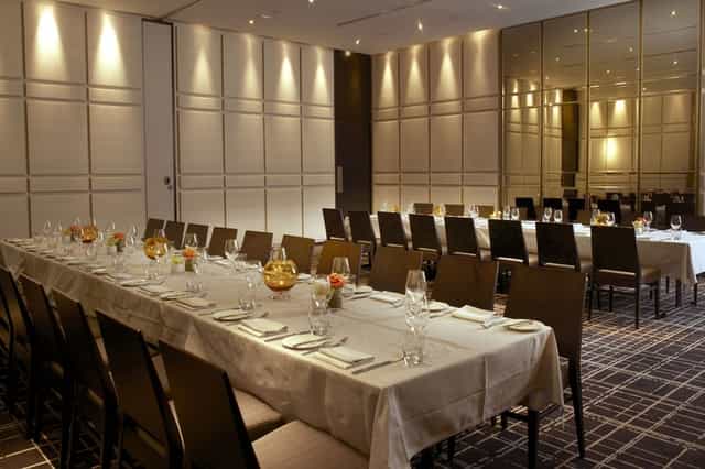 Boardroom at The Hazelton Hotel Toronto: Sophisticated long-table setup for corporate events.