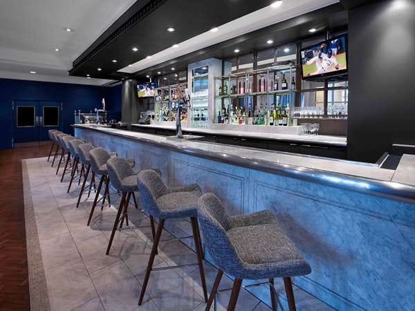 Modern Bourgogne Room hotel bar at Novotel Toronto Centre for networking and cocktail events.