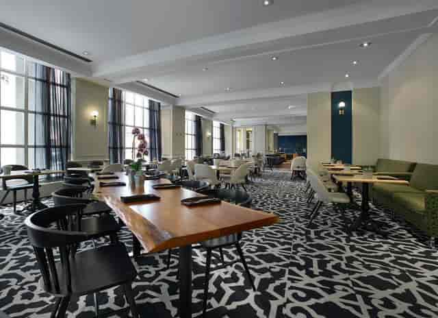 Bourgogne Room event space with lounge seating, ideal for corporate networking and dining.