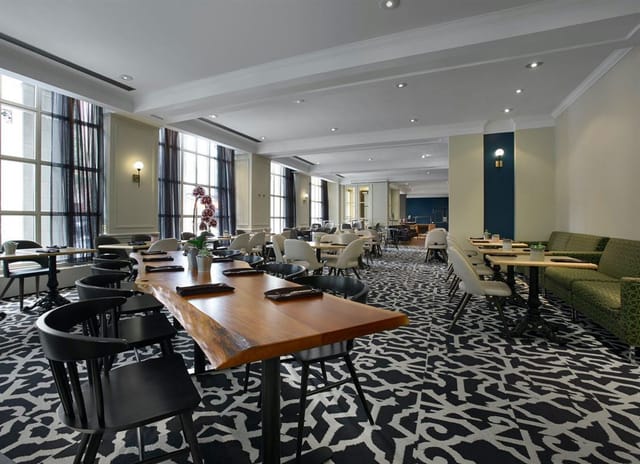 Bourgogne Room event space with lounge seating, ideal for corporate networking and dining.