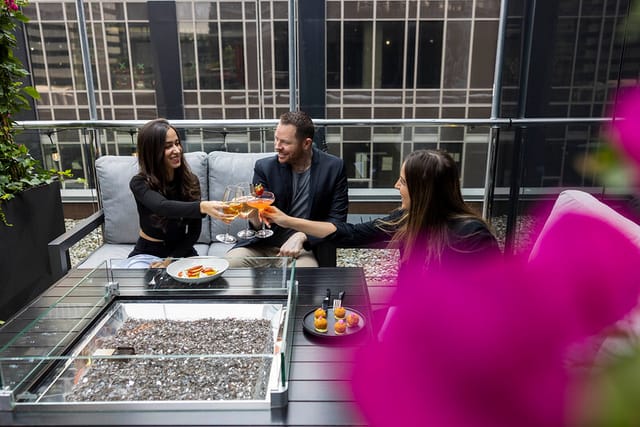 Le Germain Rooftop Terrace: modern open-air event venue for corporate networking and weddings.