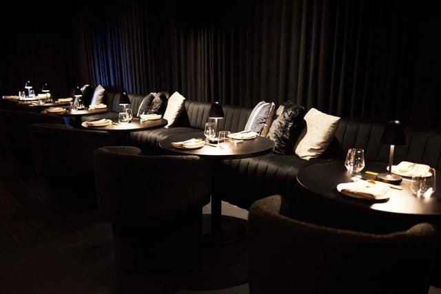 Ultra Restaurant lounge with plush banquette seating for VIP networking and executive dinners.